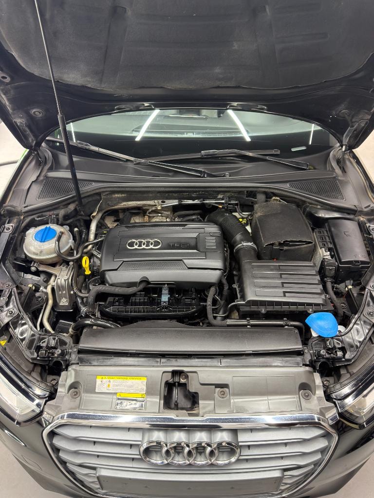 Audi engine bay being prepared for detailed care